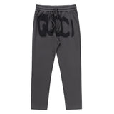 Back view of Gucci luxury clothing with monogram-inspired silhouette