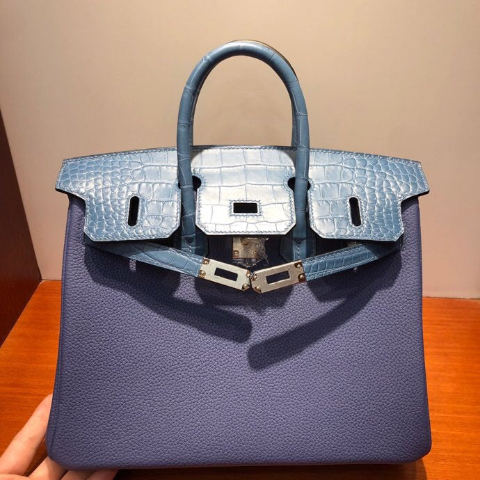 Side view of sleek structured handbag