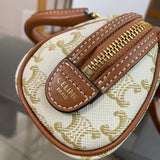 Handle and strap detail of premium structured women's handbag – women's designer-style accessory
