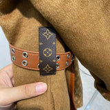 Close-up detail shot of Louis Vuitton luxury clothing with contemporary cut