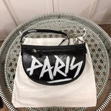 Front view of sleek structured women's handbag – women's luxury handbag