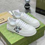 Gucci Designer sneakers in fresh white-and-black breathable knit upper front view