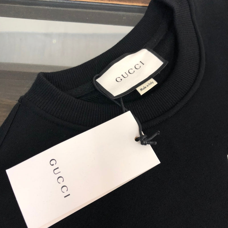 Full styled look of Gucci luxury clothing with relaxed-fit cut