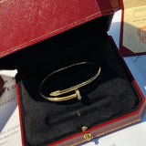 Side view of Cartier unisex jewelry piece