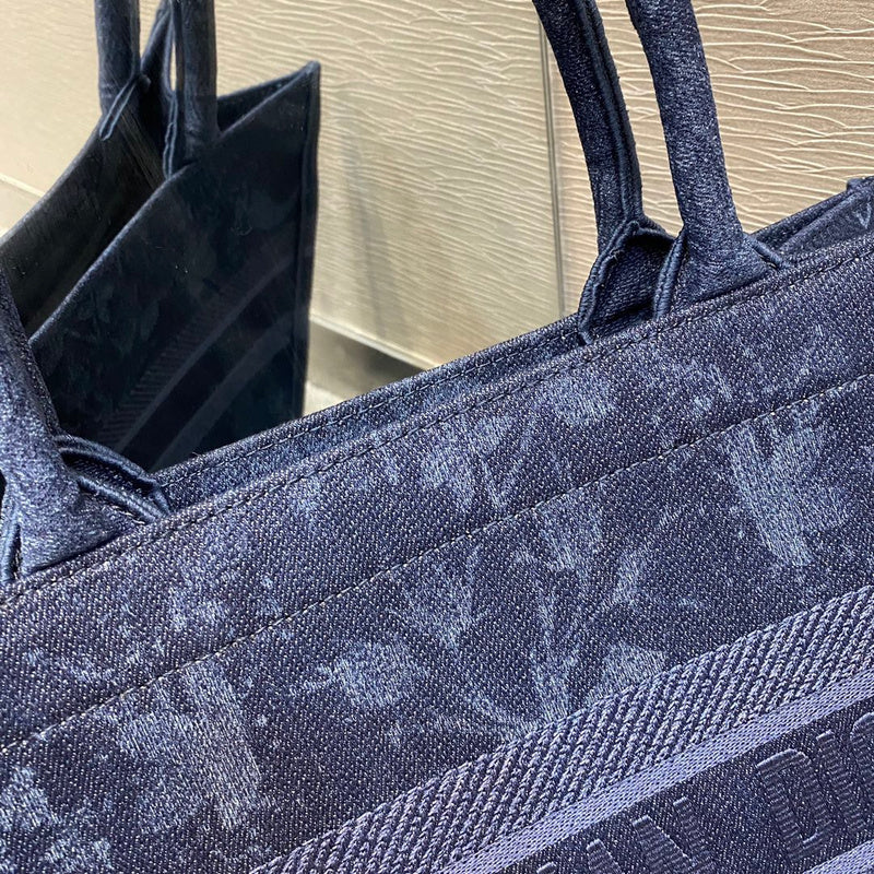 Styled lifestyle shot of modern statement women's handbag – women's luxury accessory