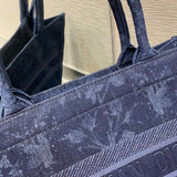Styled lifestyle shot of modern statement women's handbag – women's luxury accessory