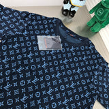 Close-up detail shot of Louis Vuitton cotton t-shirt with label-forward styling