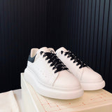 Alexander McQueen all-black luxury sneakers view 6 cushioned comfort fit