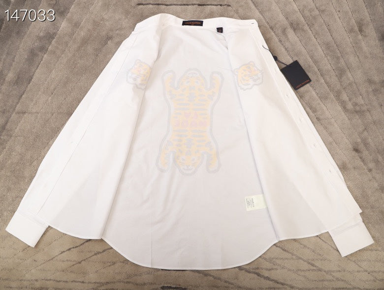 Close-up detail shot of Louis Vuitton luxury clothing with tailored silhouette