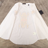 Close-up detail shot of Louis Vuitton luxury clothing with tailored silhouette