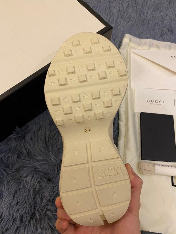 Side profile of Gucci crisp white sneakers cushioned comfort fit