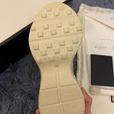 Side profile of Gucci crisp white sneakers cushioned comfort fit