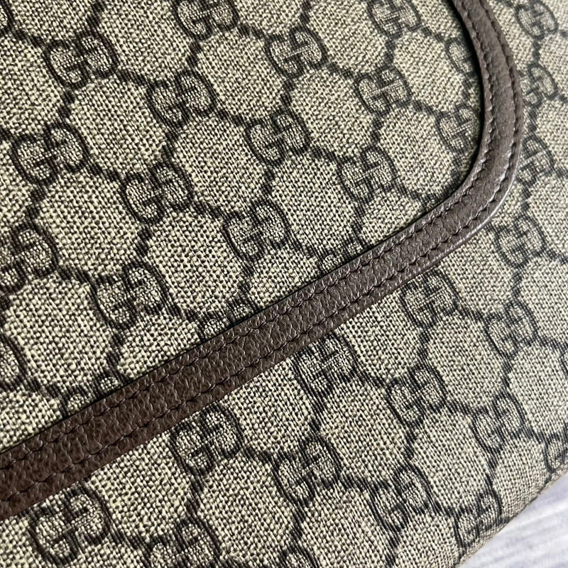 Styled lifestyle shot of refined sleek women's handbag – women's statement bag