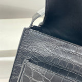 Side view of contemporary structured handbag