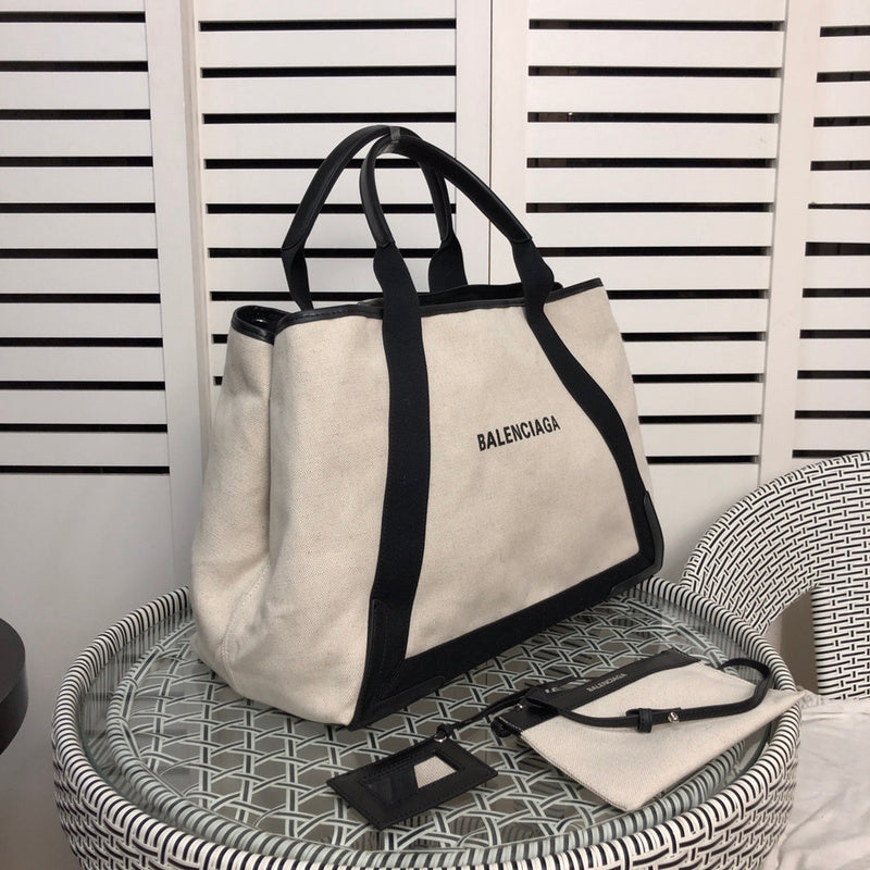 Front view of refined modern women's handbag – women's luxury accessory