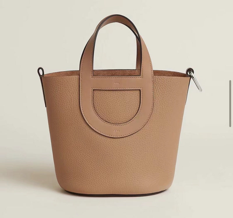 Side view of clean-lined structured handbag