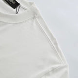 Flat lay presentation of Louis Vuitton cotton t-shirt with monogram-inspired silhouette