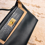 Close-up detail of understated bag design