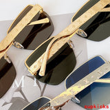 Close-up detail view of Louis Vuitton unisex sunglasses