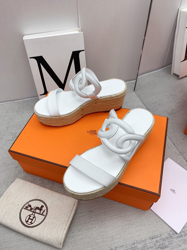Hermes shoes Style 307 - close-up of iconic logo design