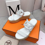Hermès White Ankle Strap Heels - Angled View