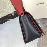 Styled lifestyle shot of statement modern women's handbag – women's statement bag