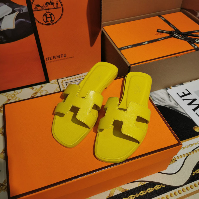 Hermès Beige Flat Thong Sandals - Lifestyle Styling Shot