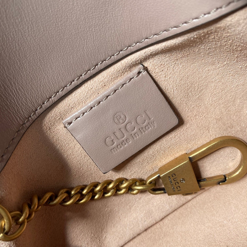 Side profile of classic polished women's handbag – women's statement bag
