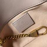 Side profile of classic polished women's handbag – women's statement bag