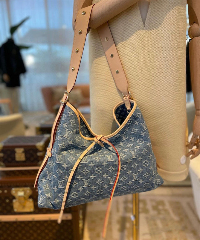  tailored top-handle bag detail view showing craftsmanship 26