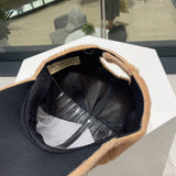 Close-up detail view of Burberry unisex cap