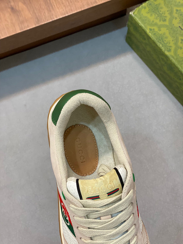 Side profile of Gucci clean off-white sneakers bold athletic profile