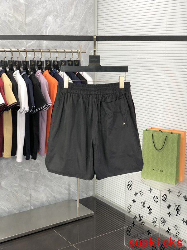 Side profile of Rhude luxury clothing with label-forward styling