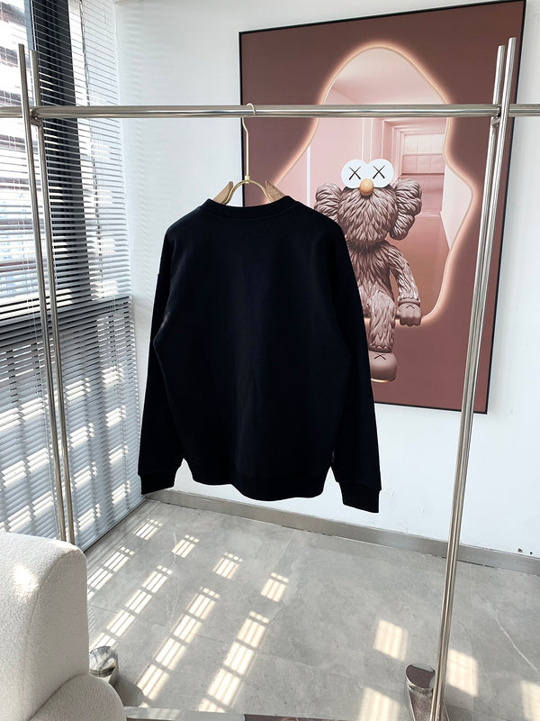 Full styled look of Gucci luxury clothing with monogram-inspired silhouette