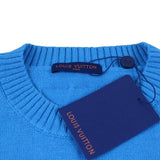 Close-up detail shot of Louis Vuitton luxury clothing with logo-detail design