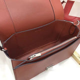 Side profile of premium modern women's handbag – women's luxury accessory