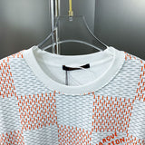 Close-up detail shot of Louis Vuitton luxury clothing with label-forward styling