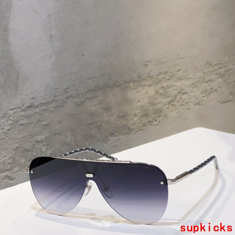 Close-up detail view of Louis Vuitton unisex sunglasses