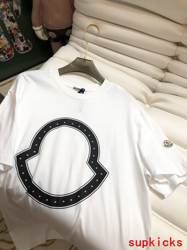 Full styled look of Moncler luxury clothing with monogram-inspired silhouette