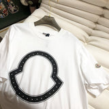 Full styled look of Moncler luxury clothing with monogram-inspired silhouette