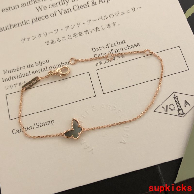 Lifestyle view of Van Cleef & Arpels unisex jewelry piece
