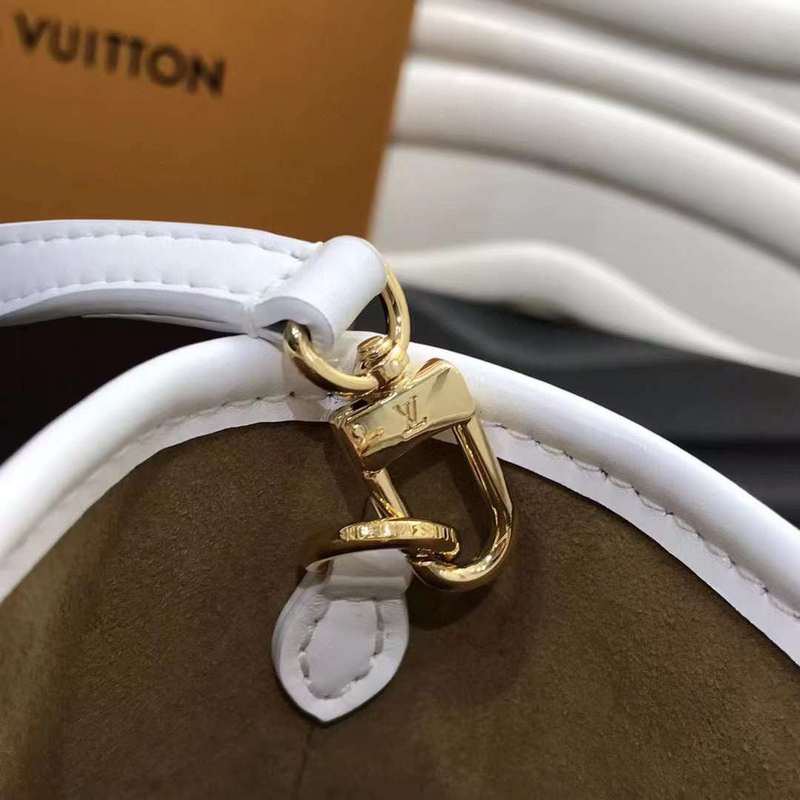 Side profile of structured modern women's handbag – women's luxury handbag