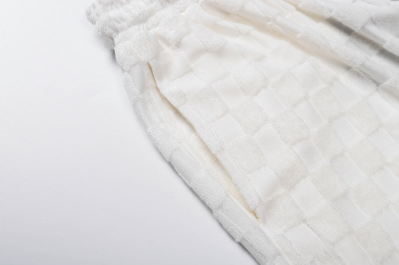 Flat lay presentation of Louis Vuitton cotton t-shirt with runway-inspired design