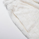 Flat lay presentation of Louis Vuitton cotton t-shirt with runway-inspired design