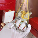 Side view of Cartier unisex jewelry piece