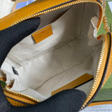 Side profile of statement structured women's handbag – women's luxury accessory