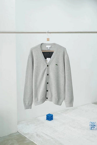 Close-up detail shot of Lacoste luxury clothing with logo-detail design