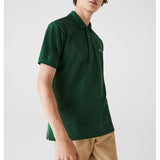 Side profile of Lacoste luxury clothing with monogram-inspired silhouette