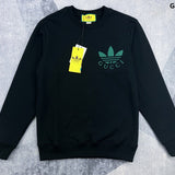 Back view of Gucci luxury clothing with signature branding