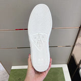 Side profile of Gucci fresh white-and-black sneakers streetwear statement look